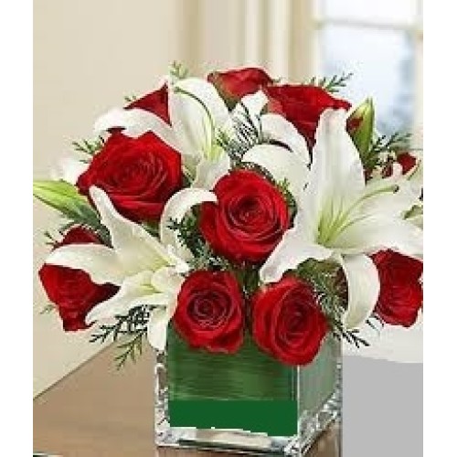 Arrangement under roses and lilium